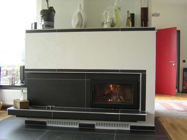 BAU.DE / BAU-Forum: 1. Bild zu Antwort "Grundofen im Reiheneckhaus: Optimale Wahl bei offener Bauweise" auf die Frage "Grundofen Strahlungswärme: Optimale Wärmeverteilung im Reiheneckhaus?" im BAU-Forum "Kamin und Kachelofen" BAU.DE / BAU-Forum: 1. Bild zu Antwort "Grundofen im Reiheneckhaus: Optimale Wahl bei offener Bauweise" auf die Frage "Grundofen Strahlungswärme: Optimale Wärmeverteilung im Reiheneckhaus?" im BAU-Forum "Kamin und Kachelofen"