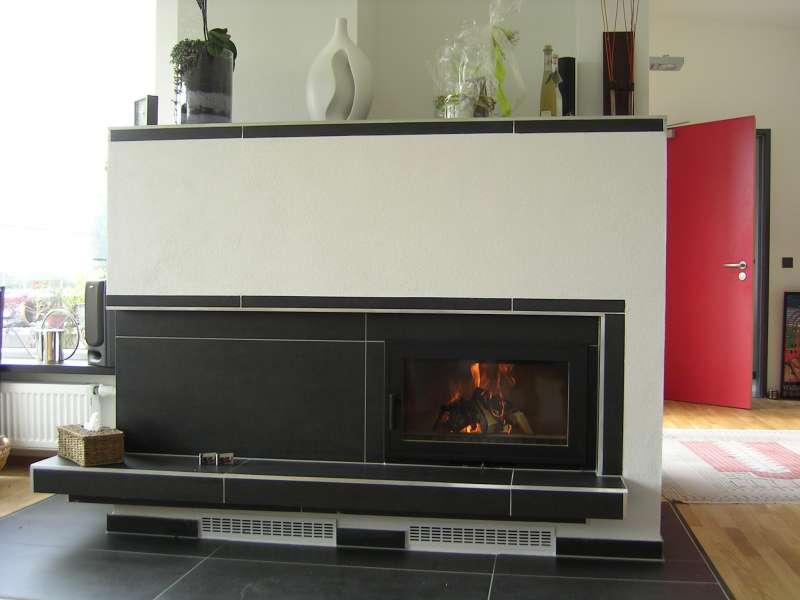 BAU.DE / BAU-Forum: 1. Bild zu Antwort "Fliesen bzw. Feinsteinzeug wird mit h&ouml;herer..." auf die Frage "Grundofen mit Feinsteinzeug verkleiden: Hitzebest&auml;ndigkeit, Alternativen & Risiken?" im BAU-Forum "Kamin und Kachelofen"