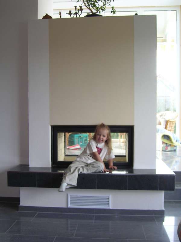 BAU.DE / BAU-Forum: 2. Bild zu Antwort "Fliesen bzw. Feinsteinzeug wird mit h&ouml;herer..." auf die Frage "Grundofen mit Feinsteinzeug verkleiden: Hitzebest&auml;ndigkeit, Alternativen & Risiken?" im BAU-Forum "Kamin und Kachelofen"